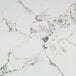 A white Art Marble table top with black veins.