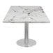 A white marble Art Marble Furniture table top on a stainless steel base.