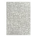 A white rectangle area rug with abstract grey block print designs.
