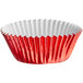 A red Enjay baking cup with a white liner.