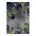 A Joy Carpets Riverstone area rug with green and blue circles.