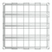 A close-up of a metal grid with holes on a white background.