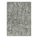 A Joy Carpets Etched In Stone area rug in gray and white with a pattern.