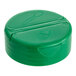 A green plastic container with a green dual-flapper spice lid with 3 holes.