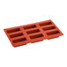 A red Pavoni silicone baking mold with nine rectangular compartments.