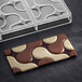 A Pavoni polycarbonate chocolate bar mold with a chocolate bar in it.