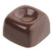 A chocolate candy in a square shape from a Pavoni Praline candy mold on a white background.