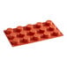 A red Pavoni silicone baking mold with 15 circles.