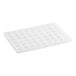 A white plastic tray with many square cavities.