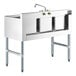 A stainless steel Regency underbar sink with a faucet.
