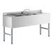 A Regency stainless steel underbar sink with 3 compartments, 2 drainboards, and a faucet.
