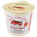 A plastic container of Pequea Valley Farm mango yogurt with a lid.