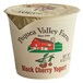 A white Pequea Valley Farm yogurt container with a red and black label.