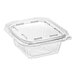 A clear Inline Plastics rectangular hinged container with a flat lid.