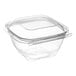 A clear Inline Plastics Safe-T-Chef square plastic container with a dome lid.
