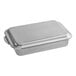 A silver metal Nordic Ware rectangular cake pan with lid.