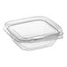 A clear square Inline Plastics Safe-T-Fresh deli container with a flat lid.