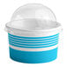 A blue and white Choice paper food container with a clear dome lid.