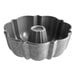 A Nordic Ware cast aluminum Bundt cake pan with a ring inside.