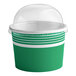 A green and white paper cup with a clear dome lid.