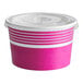 A pink paper frozen yogurt container with a white lid.