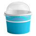 A blue and white paper cup with a clear dome lid.