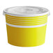 A yellow paper frozen yogurt container with a white lid.