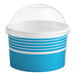 A blue and white paper container with a clear dome lid.