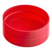A red plastic unlined spice cap.