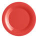An Acopa Foundations orange melamine plate with a wide rim.