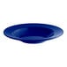 An Acopa Foundations blue melamine bowl with a wide rim.