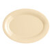 A tan oval melamine platter with a wide rim.