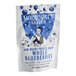 A white and blue Mixologist's Garden bag of freeze-dried blueberries with a man in a vest on the label.