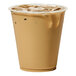 A Tossware Natural plant-based plastic cup filled with iced coffee.