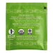 A green Harney & Sons tea packet with white text reading "Organic Green Citrus Gingko"