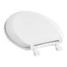 A white Centoco elongated toilet seat with cover and hinge.