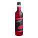 A close up of a bottle of DaVinci Gourmet Classic Prickly Pear fruit syrup with red liquid inside.