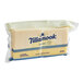 A package of Tillamook Deli Sliced Swiss Cheese on a white background.