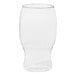 A clear Tossware plastic pint glass with a curved bottom.