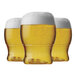 Three Tossware POP plastic pint glasses of beer with foam on top.