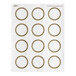 A sheet of white paper with round white labels and a metallic gold border.