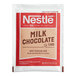 A white and red Nestle Milk Chocolate Hot Cocoa mix packet with a red and white label.