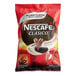 A white Nescafe Clasico Instant Coffee pouch box.