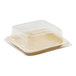 A clear plastic container lid for a Front of the House Servewise square plate.