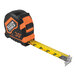 A Klein Tools tape measure with a black and orange tape.