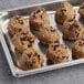A tray of Otis Spunkmeyer chunky chocolate cookie dough balls.