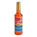 A Torani Mangonada flavoring syrup 750 mL plastic bottle with a red label.
