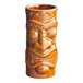 An Acopa brown ceramic tiki mug with a face carved on it.