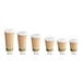 A row of EcoChoice Kraft paper hot cups with PLA lids.