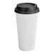 A white paper hot cup with a black plastic lid.